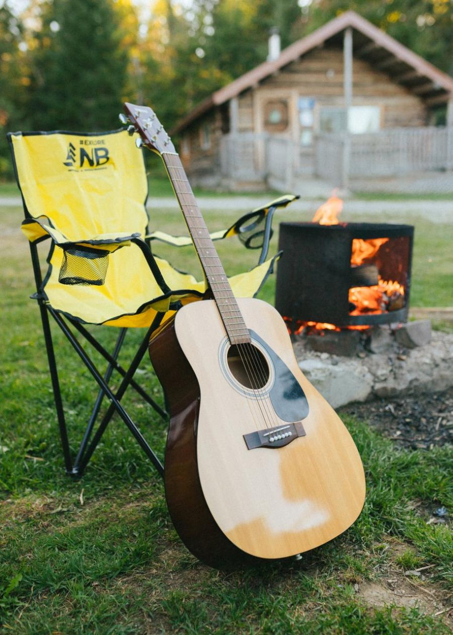 Campfire and guitar at a Heritage Cabin, Mount Carleton Provincial Park