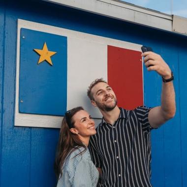 Couple Selfie Acadian Flag